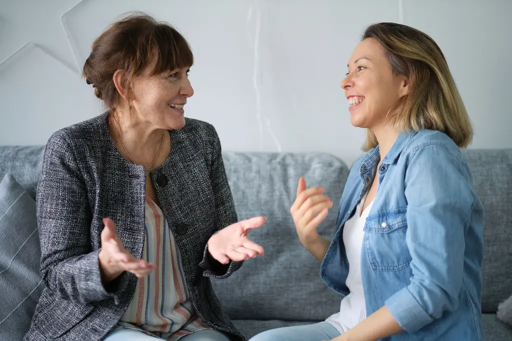 adult-daughter-talking-his-elderly-mom-mother-daughter-having-fun-enjoying-talk-sit-sofa-modern-living-room-parent-relationship-concept_kl.webp